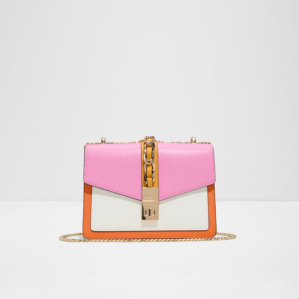 Pink and white handbag with gold chain on a light gray background